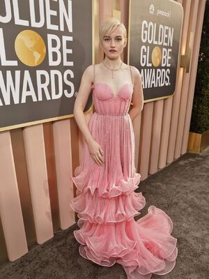 Julia Garner in pink dress at the Golden Globe Awards in Los Angeles
